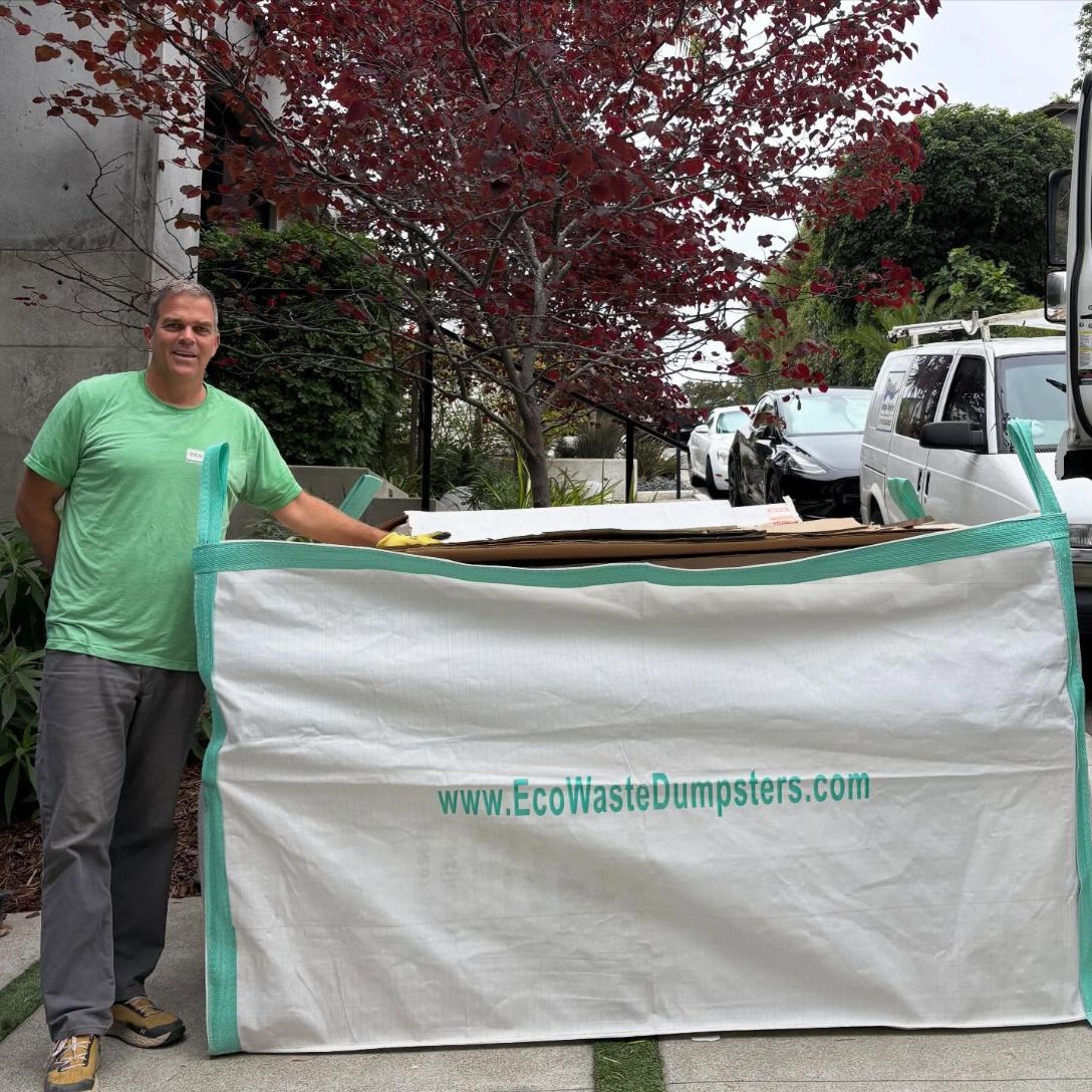 Eco Waste dumpster bag with a person for scale